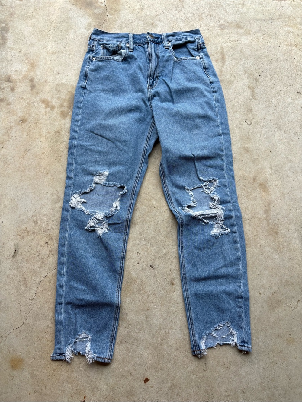 American Eagle Outfitters Mom Jeans
Blue denim with distressed rips